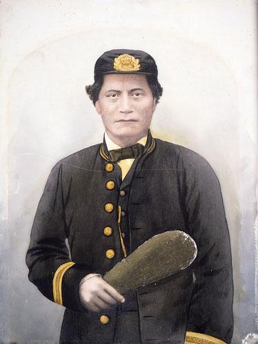  Portrait of Rawiri Puaha in European dress holding a mere. c.1890s